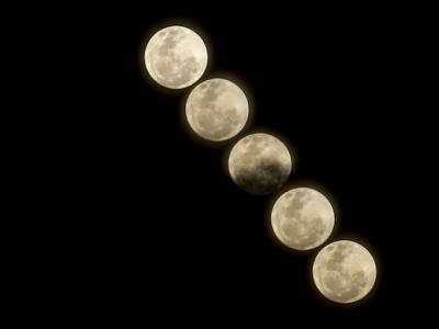 Composite of a series of moon photos.