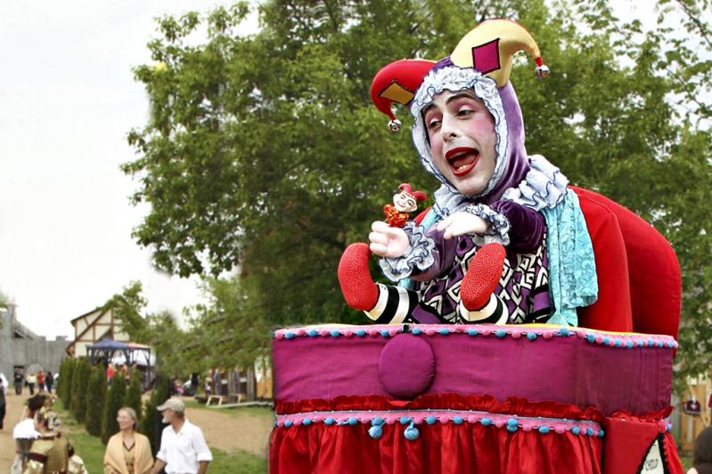 Competition entry: Baby Throwing Tantrum in Booster Chair - Clown on Stilts