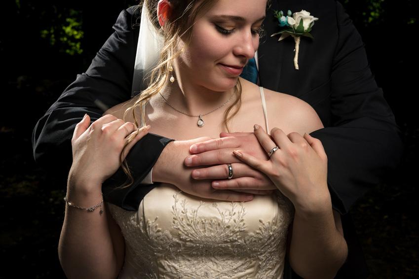 A peaceful moment between a bride and her husband at Celebrations on the River by La Crosse Photographer Jeff Wiswell of J.L. Wiswell Photography