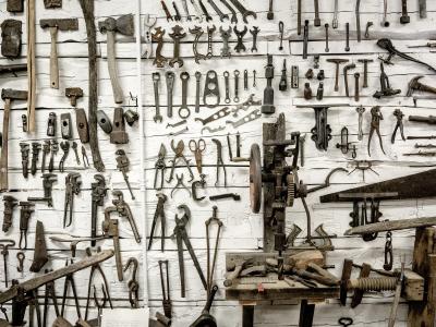 Wall filled with old tools.